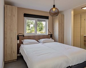 Comfortabele slaapkamer in Vrijstaande woning in Hollum, Ameland, vakantiehuis met rustige sfeer op de Waddeneilanden.