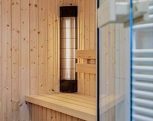 Gezellige sauna in Vrijstaande woning in Hollum, Ameland, vakantiehuis met wellnessfaciliteiten op de Waddeneilanden.