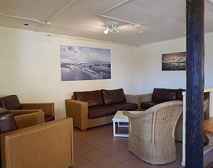 Gezellige zithoek in De Achterschuur, vakantieaccommodatie in Hollum, Ameland.