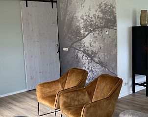 Gezellige zithoek in Zonnehoeve-zonnewende, vakantieaccommodatie in Hollum, Ameland.