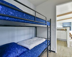 Gezellige kinderslaapkamer in Vrijstaande woning in Hollum, Ameland, met stapelbed.