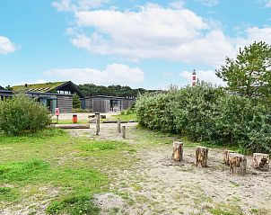 Omgeving van Vrijstaande woning in Hollum, Ameland, met uitzicht op de vuurtoren.
