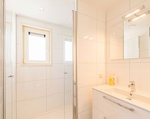 Waddenlodge 6, een charmant vakantiehuis in Hollum, Ameland, omgeven door duinen en natuur op de Waddeneilanden.