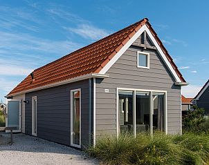 Waddenlodge 6, een charmant vakantiehuis in Hollum, Ameland, omgeven door duinen en natuur op de Waddeneilanden.