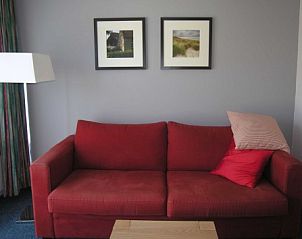 Gemtliches Wohnzimmer in Amelander Kaap nr. 54, Wohnung in Hollum, Ameland. Gemtliche Sitzecke zum Entspannen auf den Watteninseln.