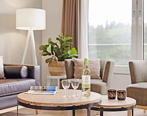 Stijlvolle zithoek in Ameland State appartement in Nes, Ameland, ideaal voor ontspanning.