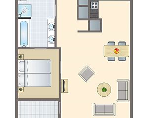 Gemtliche Sitzecke in der Wohnung auf Ameland State in Nes, Ameland, mit Blick ins Grne.