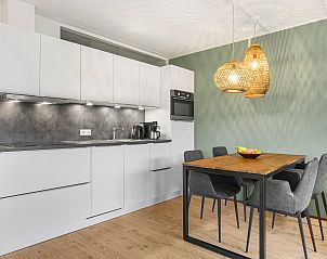 berdachter Esstisch in Ameland State 4-Bett-Wohnung in Nes, Ameland.