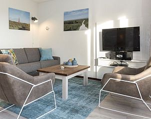 Zithoek met televisie in Vitamaris 4-6-persoons appartement, Schiermonnikoog.
