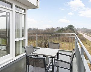 Balkon met uitzicht op natuur in Vitamaris 6-persoons appartement, Schiermonnikoog.