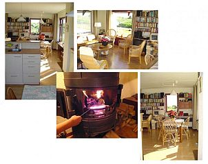 Gezellige binnenruimte van Casa Maris op Schiermonnikoog met open haard en boekenplanken, Waddeneilanden.