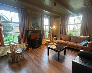 Knusse woonkamer in Huisje in Schiermonnikoog, vakantieverblijf in Schiermonnikoog, Waddeneilanden.