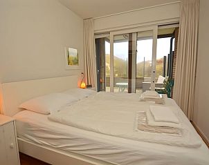 Comfortabele slaapkamer in Vakantiehuis in Schiermonnikoog met toegang tot terras, Schiermonnikoog, Waddeneilanden.