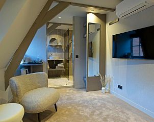 Comfortabele zitruimte in Hotel De Koegelwieck Terschelling, vakantieappartement in Hoorn met moderne voorzieningen.