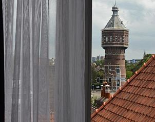 Uitzicht op watertoren vanuit Hotel Restaurant Piccard, Vlissingen, Walcheren, Zeeland met historische charme.