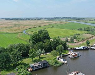 Vakantiehuis FR060 in Warns, gelegen aan het IJsselmeer met uitzicht op de Friese meren en omliggende natuur.