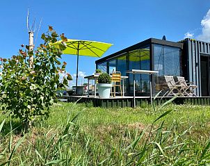 Verblijf 061210 • Vakantiewoning IJsselmeer • Prachtige 2 persoons glamtainer in Friesland aan het water 