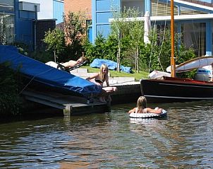 Cozy waterfront at Recreation Company 'on the water' in Heeg, Frisian lakes.