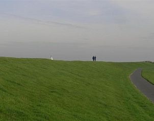 Green dike walk near Recreation Company 'on the water' in Heeg, Frisian lakes.