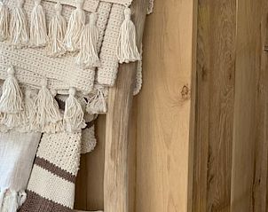 Gezellige dekens en textiel in Vakantiehuisje in Elahuizen, Friese meren.