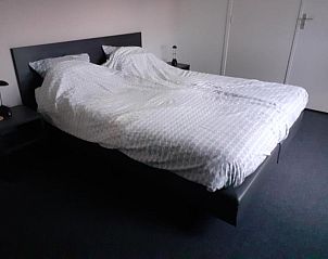 Luxe slaapkamer in B&B Fam. Tavenier, Vrouwenpolder, Walcheren, met moderne inrichting voor comfort.