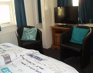 Knusse zitruimte in B&B Fam. Tavenier, Vrouwenpolder, Walcheren, perfect voor ontspanning na een dag verkennen.