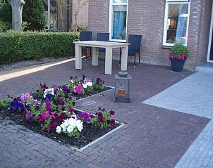 Gezellig terras bij B&B Fam. Tavenier, Vrouwenpolder, Walcheren, ideaal voor buitenontbijt of avondontspanning.