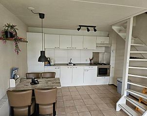 Eetruimte met keuken in appartement De Groede, Oosterend, Terschelling