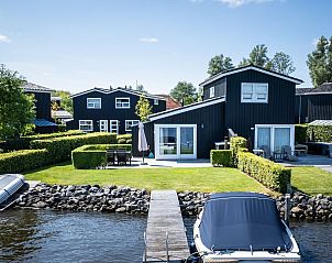 Vakantiehuis aan het water in Terherne, 2-4-persoons bungalow bij Friese meren.