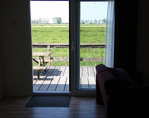 Binnenruimte van Huisje in Terherne met terraszicht, vakantiehuis in Terherne, Sneekermeer.