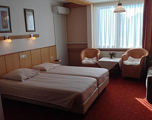 Gezellige zithoek in SuyderSee Hotel, vakantieappartement in Enkhuizen, Noord-Holland.