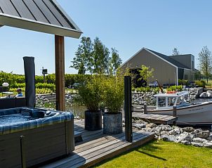 Verblijf 130103 - Vakantiewoning Bergumermeer - Recreatiewoning aan open vaarwater in Friesland