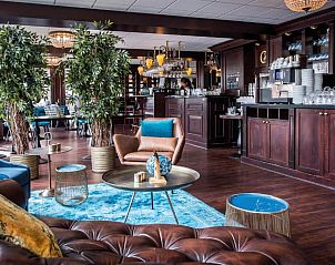 Gezellige bar in Fletcher Hotel-Restaurant Arneville-Middelburg, ideaal voor ontspanning in Middelburg, Zeeland.
