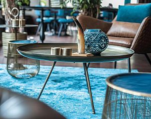 Elegant ingerichte zithoek in Fletcher Hotel-Restaurant Arneville-Middelburg, vakantieappartement in Middelburg, Zeeland.