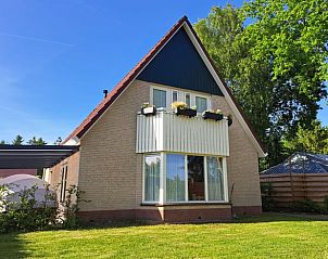 Huisje in Schoonloo in Drenthe met weelderige tuin en zonnige omgeving.