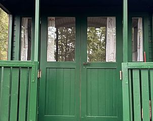 Charmant Eingang des Ferienhauses in Papenvoort, gelegen in der grnen Natur von Midden Drenthe, Drenthe.