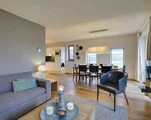 Knusse slaapkamer in Hof van Saksen 8-persoons boerderij 8L1, Nooitgedacht, met zacht beddengoed voor ultiem comfort.