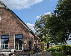 Zijaanzicht van Vakantiehuisje in Wezup, een charmant verblijf in Midden Drenthe.