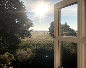 Adembenemend uitzicht op het landschap vanuit Vakantiehuis in Peize, Noord Drenthe.