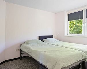 Slaapkamer in Vakantiehuis in Een, Noord Drenthe, met tweepersoonsbed.