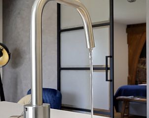 Stijlvolle kraan in Vakantiehuis in Een, Drenthe, met moderne afwerking en design.