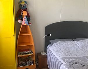 Kinderkamer met kleurrijke inrichting in Huisje in Schipborg, vakantiehuis in Noord Drenthe.