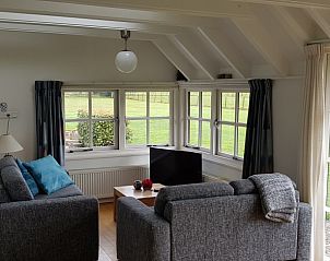 Gezellige zithoek in de woonkamer van Gasteren Stee en Stoede vakantiehuis in Gasteren, Noord Drenthe.