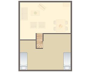 Gezellige woonkamer in Het Land van Bartje 4-persoons bungalow 4B1, Ees, Drenthe, met houten interieur en comfortabele zitplaatsen.