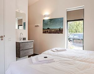 Comfortabele slaapkamer in Huisje in Zeegse, vakantiehuis in Noord Drenthe, met moderne faciliteiten.