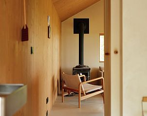 Sfeervolle houtkachel in Vakantiehuis in Veenhuizen, gezelligheid in Noord Drenthe, Drenthe.