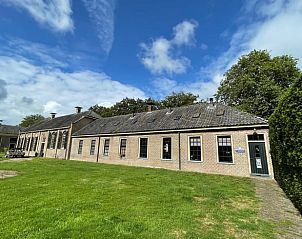 Vakantiehuis in Veenhuizen, Noord Drenthe, charmant exterieur met groene omgeving.