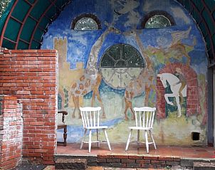 Gezellig terras bij Vakantiehuis in Altena, ideaal voor ontspanning in Noord Drenthe, Drenthe.