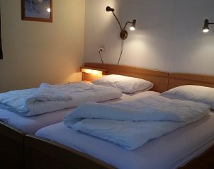 Sfeervolle slaapkamer in Vakantiehuis in Meppen, Zuidoost Drenthe, voor een goede nachtrust.