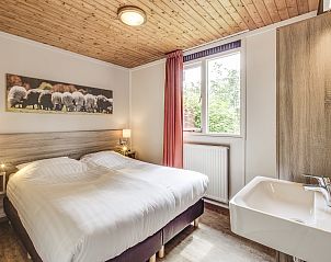 Spacious shower in Aelderholt 2-bed bungalow 2C in Aalden, Drenthe with modern tiles.